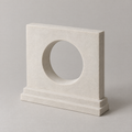 Moon Gate in chalk white, cast mineral composite, studio photograph