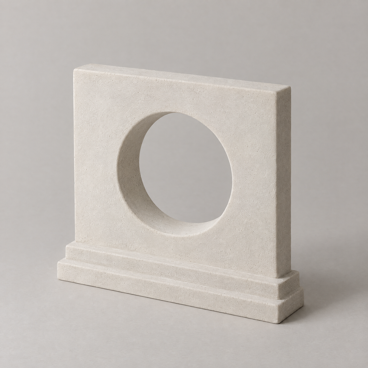 Moon Gate in chalk white, cast mineral composite, studio photograph