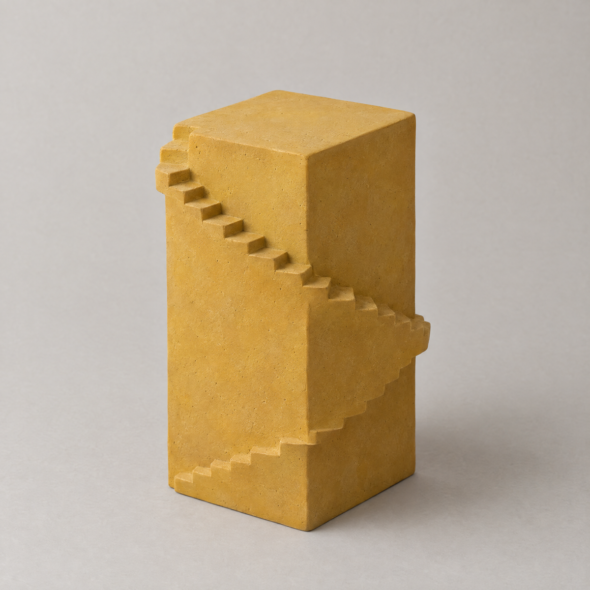 Turning Stair in ochre, cast mineral composite, studio photograph